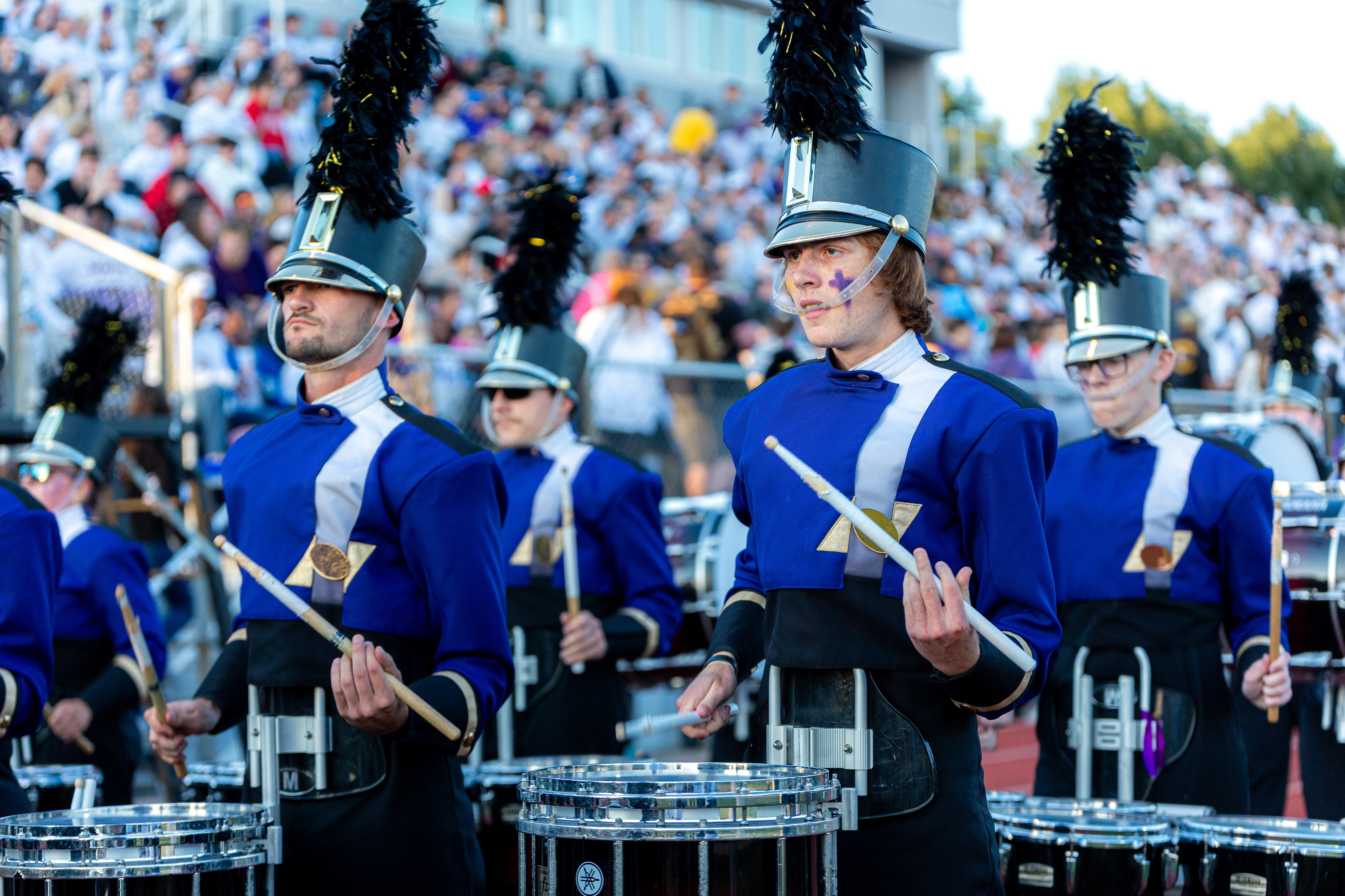 Band entering the football stadium