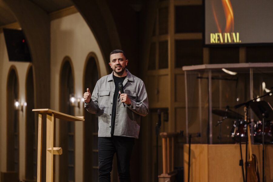Shane Lima speaking on stage