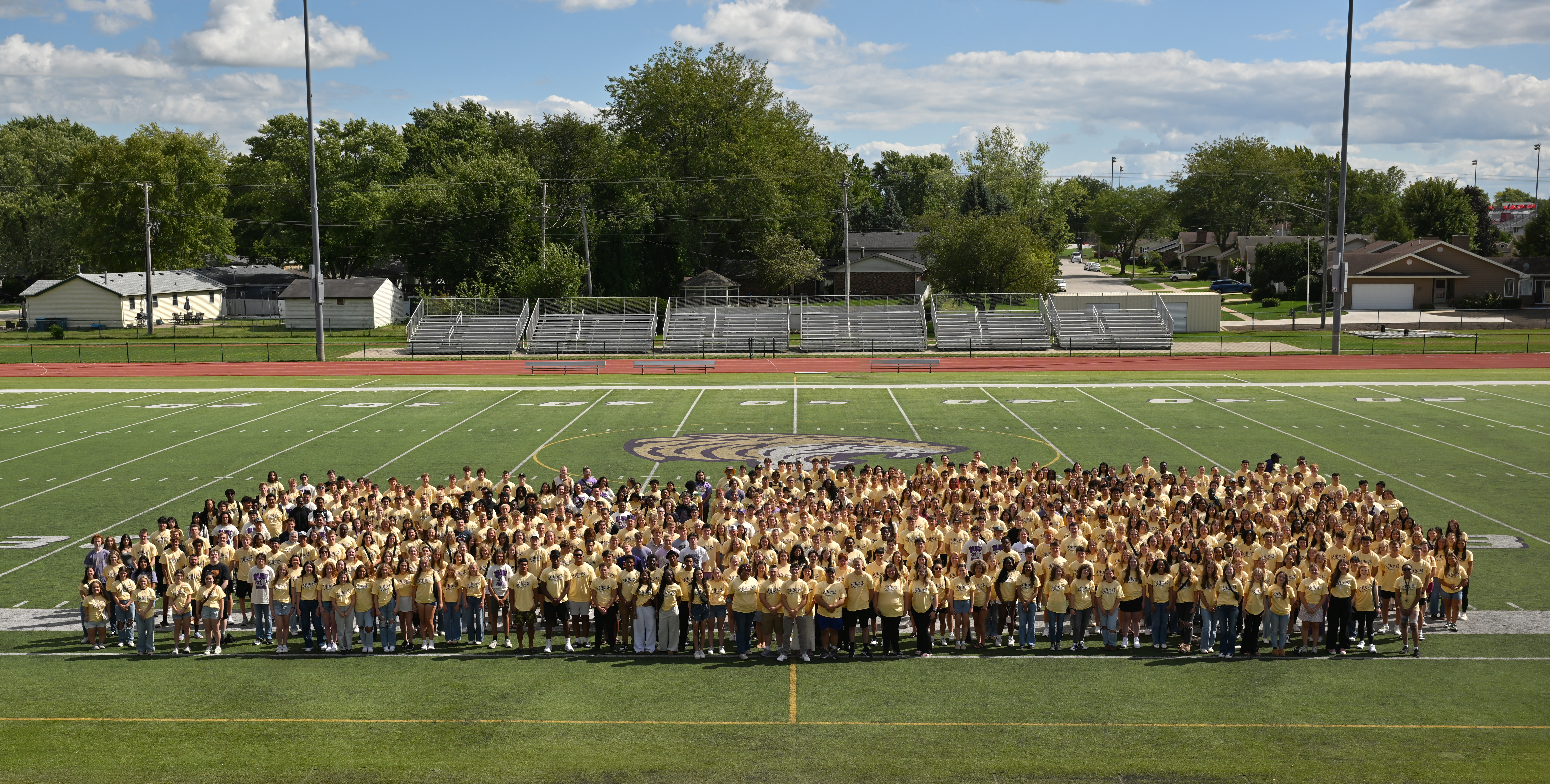 New students standing on Ward Field
