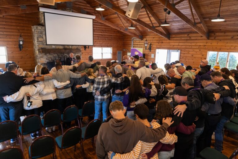 group worshipping in warming house