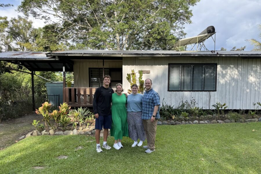 The Slibeck family in front of a house