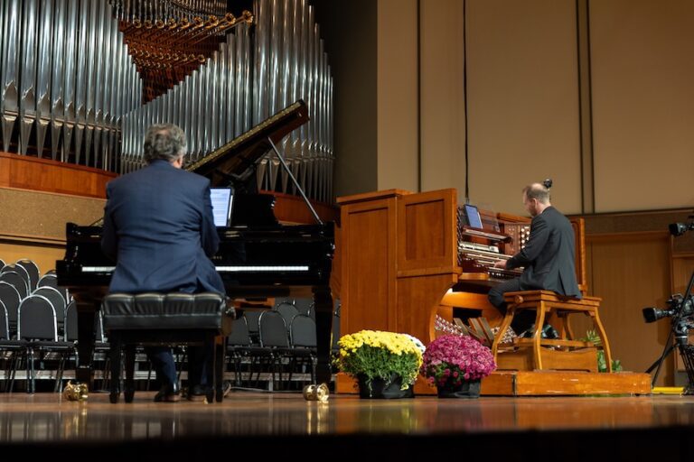Men playing organ