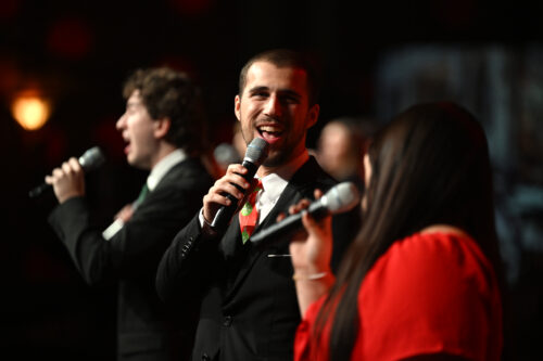 Close up photo of a man singing