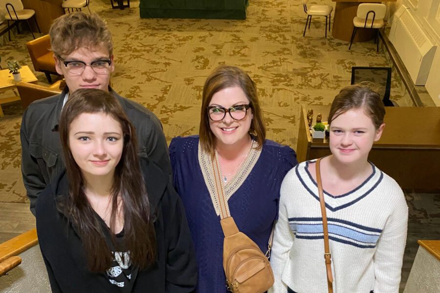 Holly with her kids at Olivet's homecoming