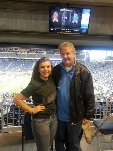 Rachel at a Lions game as a fan
