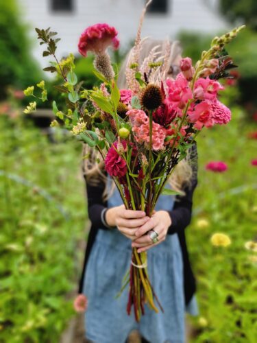 Janie holding flowers.