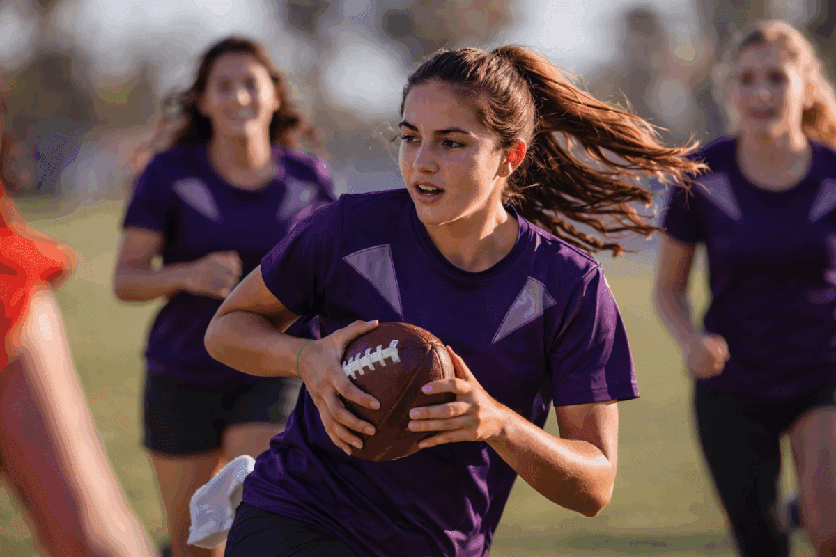 girl playing football