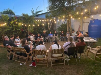 Hope with students from Olivet having a meal outside.