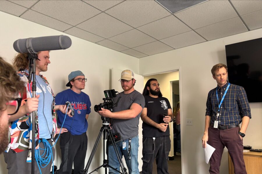 Group of people getting ready to film.