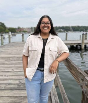 Jessica Gil standing on a dock.