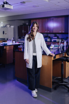 Sadie Blaszcyk standing in a lab