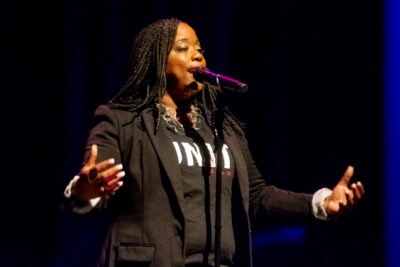 Sherri singing on stage