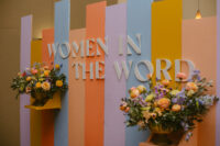 A picture of the Women in the Word sign