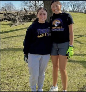 A picture of members of the women's golf team during the cleanup