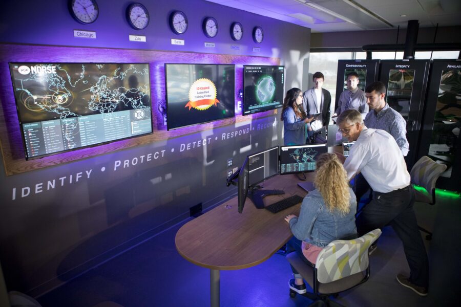 A picture of people working in a computer lab.