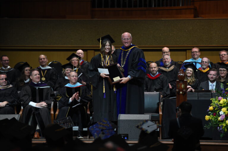 Sadie receiving her award from Dr. Chenoweth