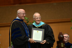 A picture of Jeff Williamson receiving his award.