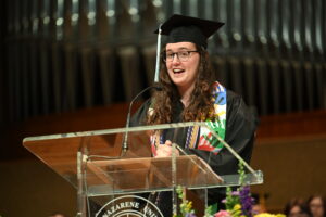 Hannah speaking at graduation.