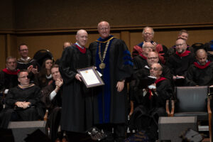 Jon receiving his award