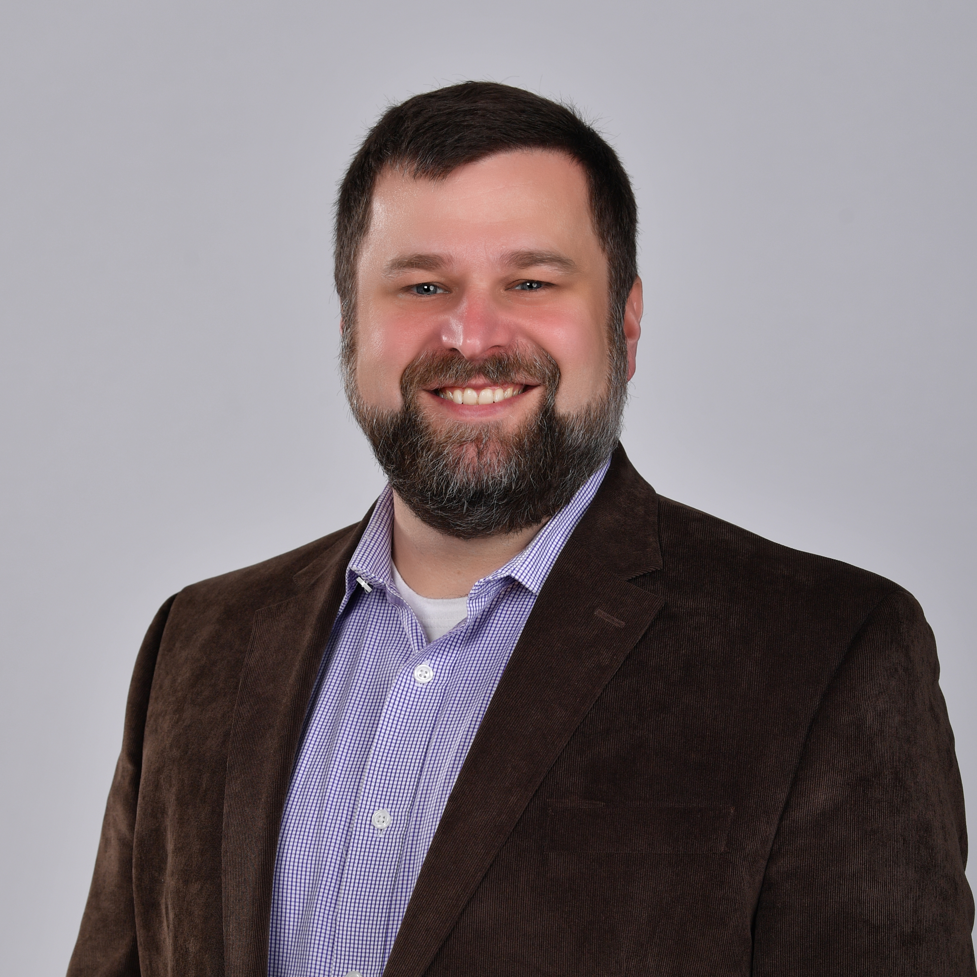 A headshot of Dr. Carrigan.