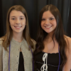 A picture of Paige and Olivia at an event.