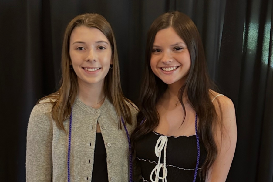 A picture of Paige and Olivia at an event.