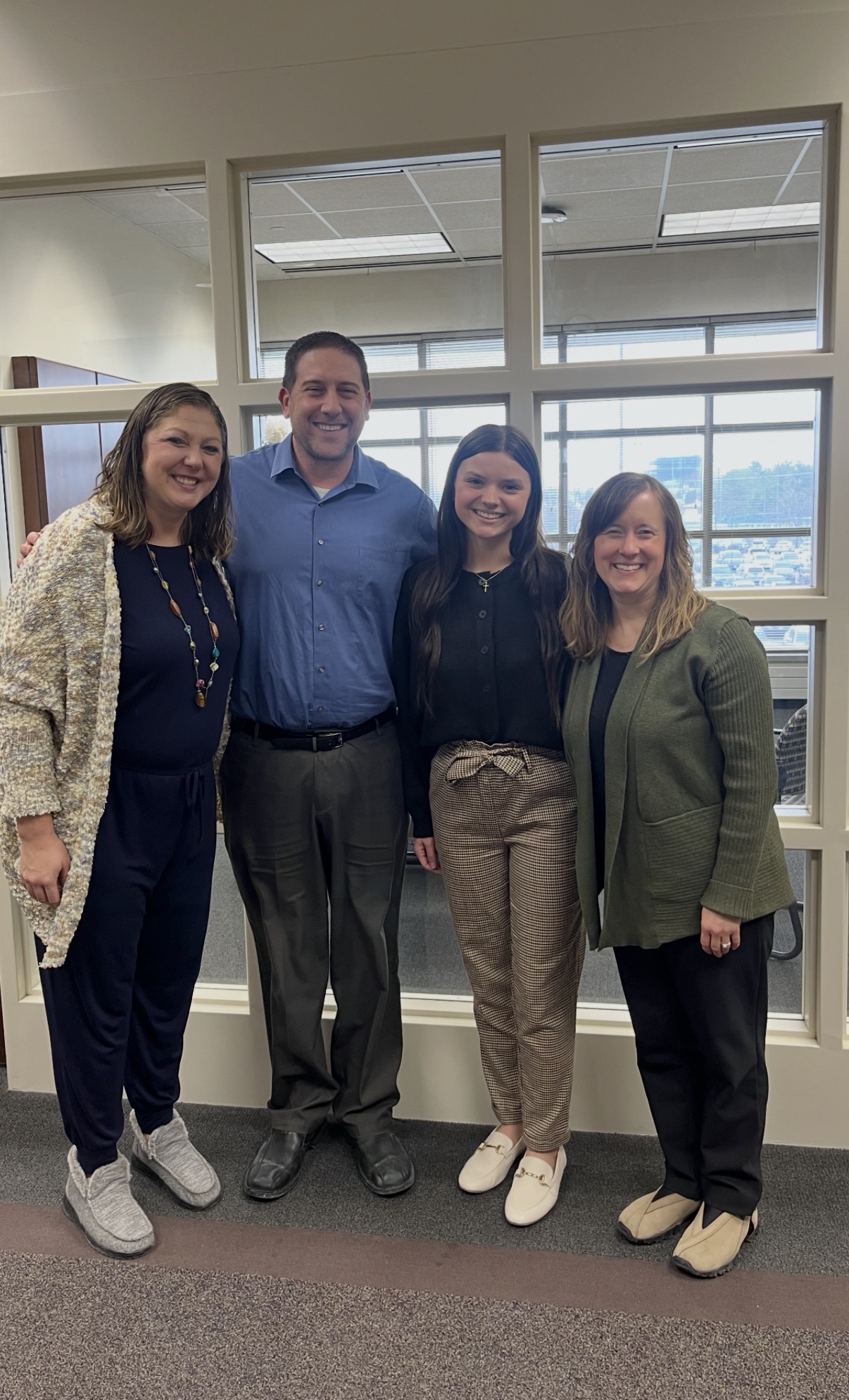 A picture of Olivia with some of her professors.
