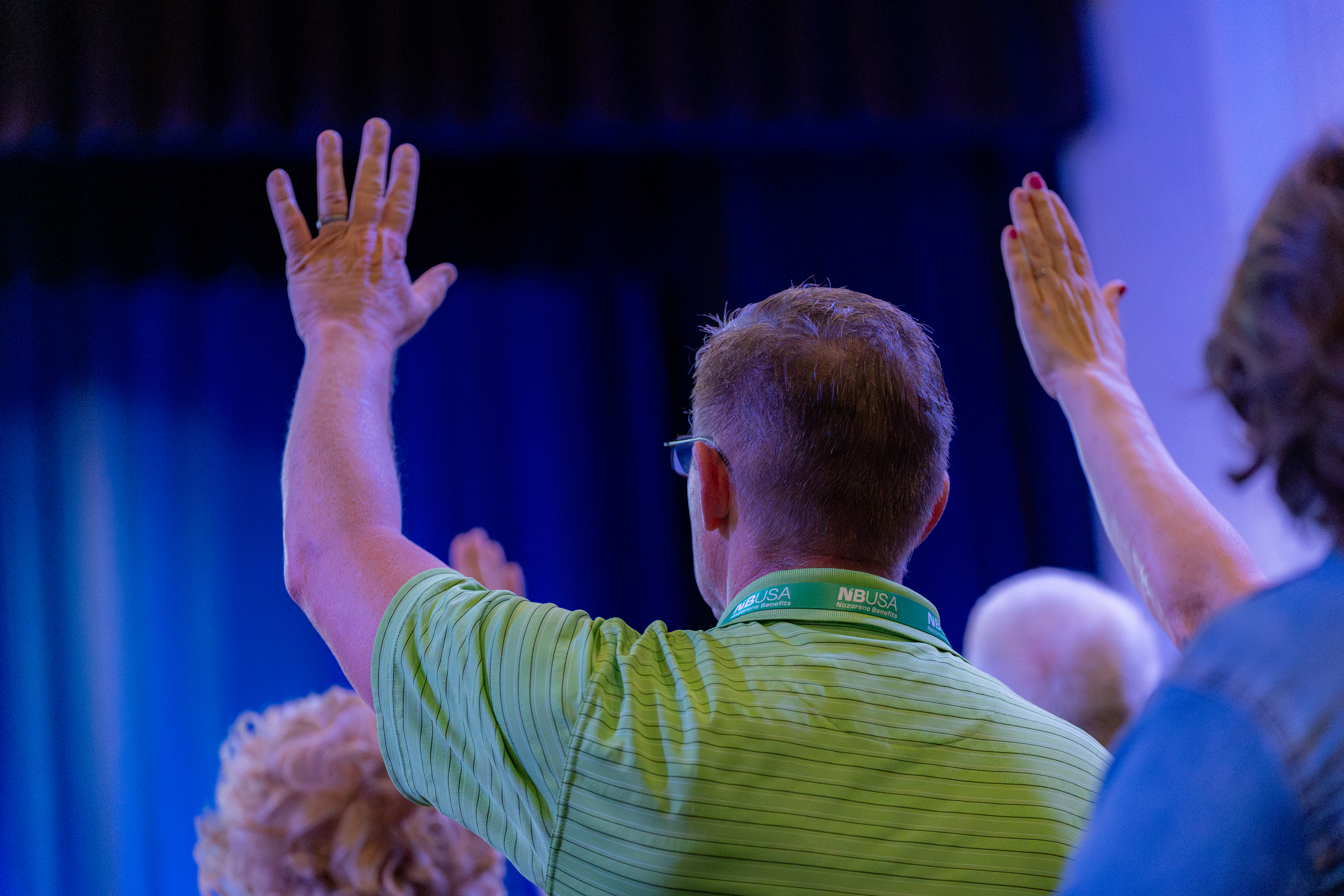 A picture of people worshiping at PALCON