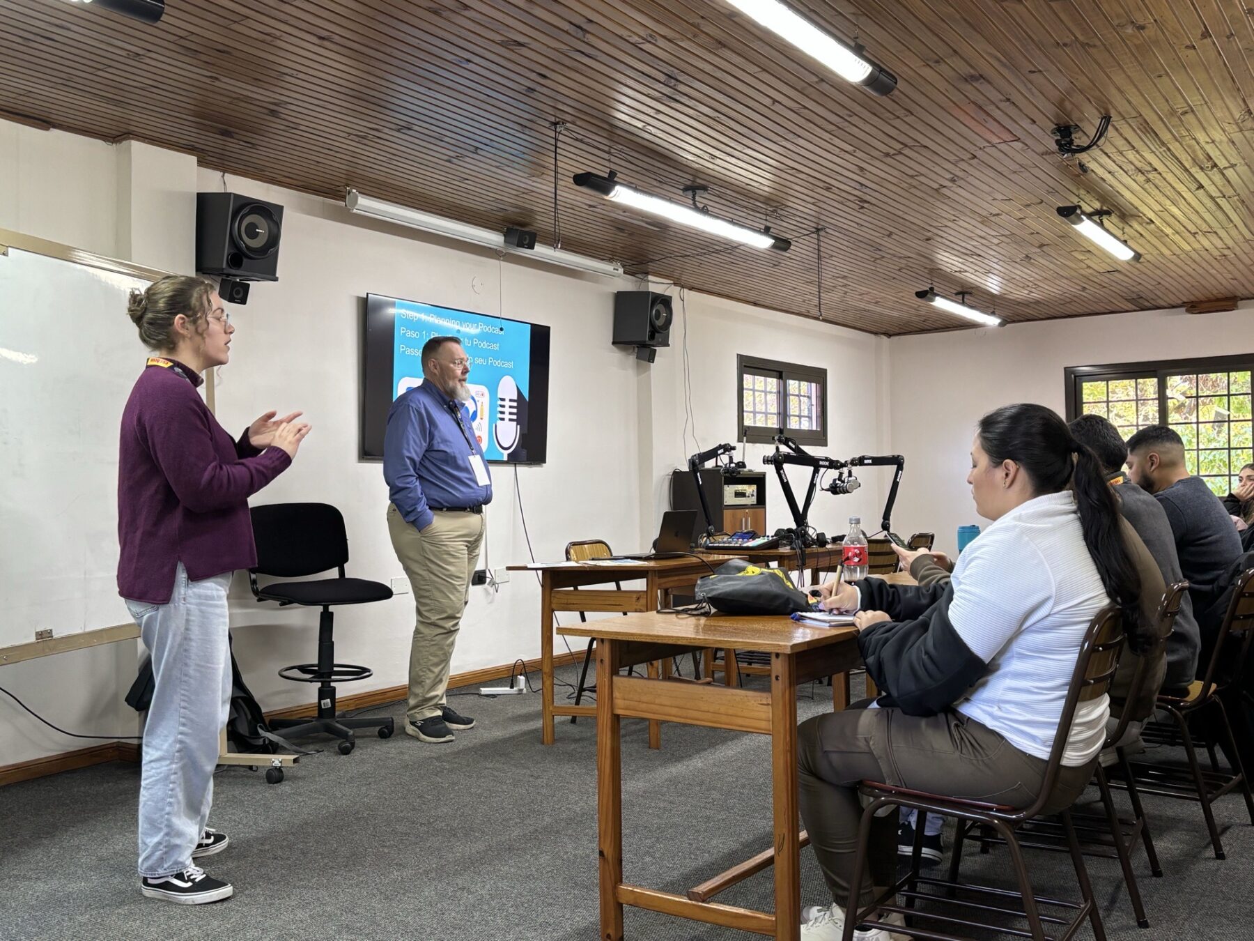 A picture of Brian Utter teaching radio techniques.