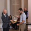 A picture of Nicholas receiving his award
