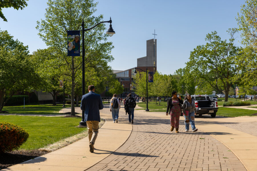 A picture of students walking to chapel on Olivet's campus.