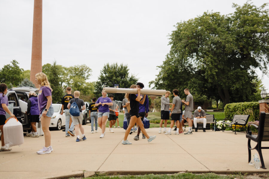 A picture of students moving into their dorms.