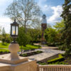 A picture of Olivet's campus with the clock tower and an outdoor light.